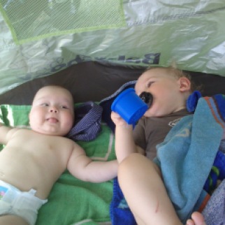 two babies in a tent